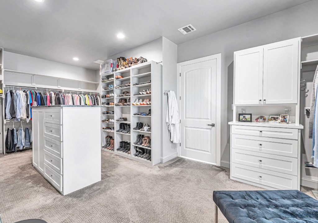 Primary closet is larger than most bedrooms with w